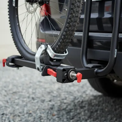 Close-up of the Thule T2 Pro XTR's robust hitch connection and wheel cradle system, highlighting durability and security